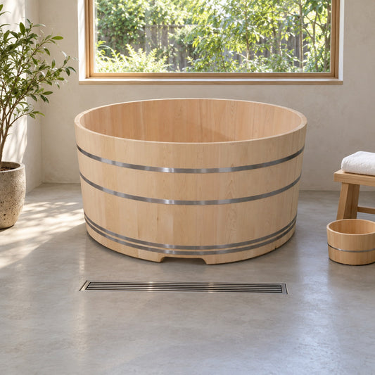 Hinoki bathtub, round barrel type, in a bright bathroom. AI-generated image; actual grain and proportions vary by size.